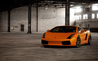 Bright orange sports car parking - a large window free wallpaper for desktop
