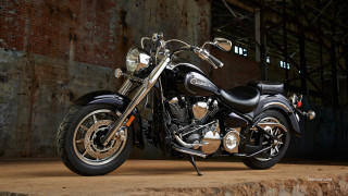 Motorcycle parked brick wall warehouse - brenda chamberlain free wallpaper