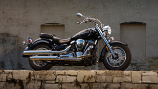 Motorcycle parked stone wall brick - chrome free wallpaper for desktop