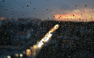Rainy city night astronaut moon - a tilt shift photo free wallpaper