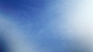 Snowboarder air sky blue clouds - a sky background behind them free wallpaper