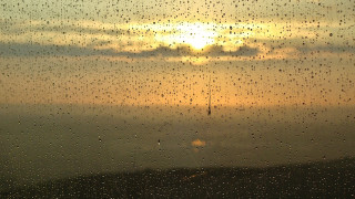 Sunset rainy window cellphone tower - foggy free wallpaper