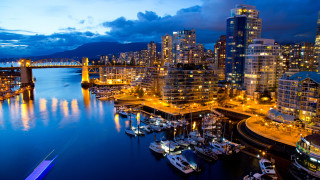 City skyline bridge boats night - a bridge in the distance free wallpaper
