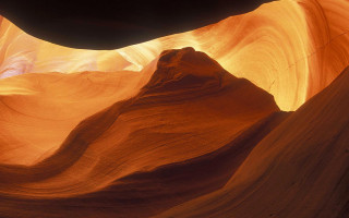 Large rock formation central cave - a large rock formation free wallpaper