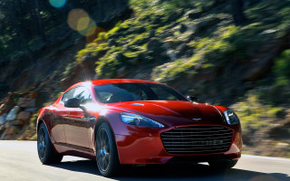 Red car mountain road sunflare - a mountain side free wallpaper