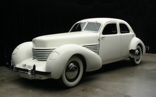 White car garage black background - a black curtain behind free wallpaper