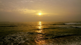 Sunset ocean waves beach dawn 2 - the beach in the distance free wallpaper