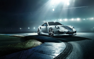 White porsche night stadium lights - a dark street free wallpaper