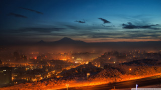 City skyline night mountain background - a few car free wallpaper