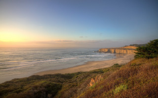 Beach cliff sunset landscape trees - a cliff and a body of water free wallpaper for desktop