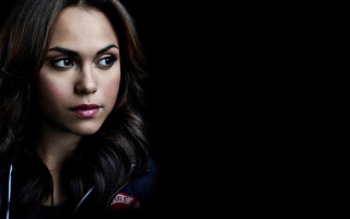 Woman longhair blackjacket seriousportrait cloisonnism - a black jacket free wallpaper for desktop