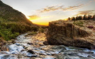 River valley mountains sunset cloudy 3 - a mountain in the background and trees free wallpaper