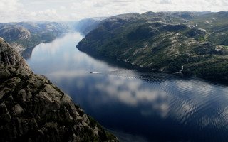 Mountain lake boat landscape sky - the water near free wallpaper