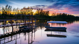 Docked boat sunset cityscape impressionist - ding guanpeng free wallpaper