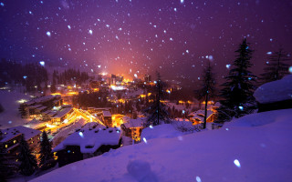 Snowy night town lights magic - a snowy night free wallpaper