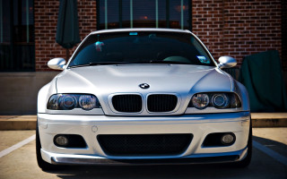 White car parking lot brick - a green umbrella free wallpaper