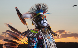 Feathered man sunset sky birds - headdress free wallpaper