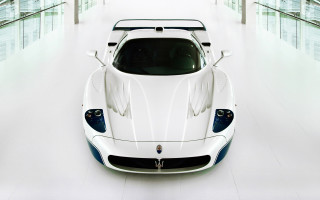 White sports car marble sculpture - a white floor free wallpaper