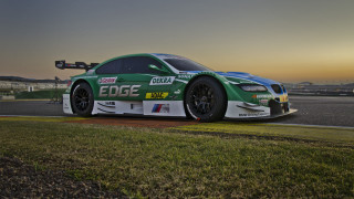 Green race car sunset tilt - a sky background and grass free wallpaper