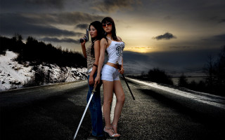 Two women sword beach clouds - their hand and a sky background free wallpaper