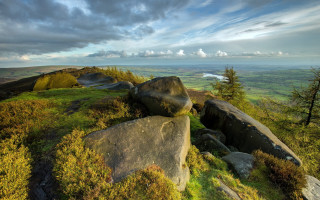 Rocky outcropping valley lake cloudy - wide angle len free wallpaper