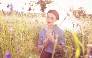 Woman flower field umbrella smile - an umbrella free wallpaper