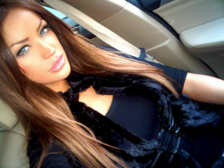 Woman car hair phone seatbelt - a picture free wallpaper