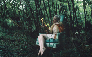 Woman forest candle book cinematic - her hand and a book in her other hand free wallpaper