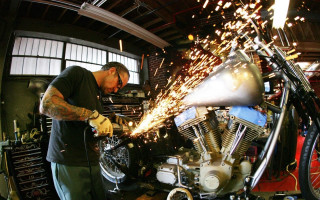 Man motorcycle garage sparks beard - ed roth free wallpaper