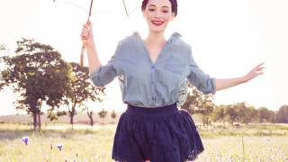 Woman field umbrella smiling outstretched - free vintage wallpaper for desktop