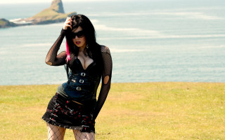 Woman black outfit red umbrella - a red umbrella free wallpaper