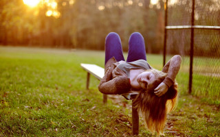 Park bench relaxing portrait blurry - their leg free wallpaper