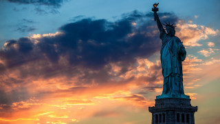 Statue of liberty sunset clouds - a statue of liberty free wallpaper