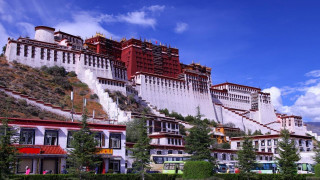 Large building hill red roof - top of a hill free wallpaper