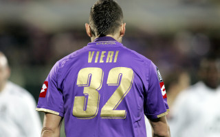 Purple jersey man stadium crowd - a stadium free wallpaper