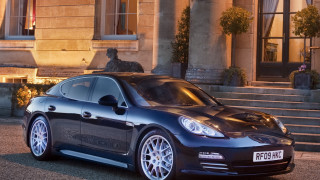 Black car building statue night - alan sutherland free wallpaper