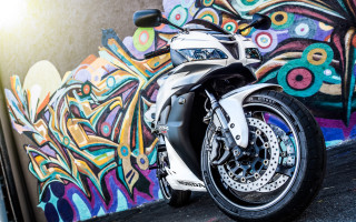 Motorcycle colorful wall graffiti doorway - a colorful wall free wallpaper