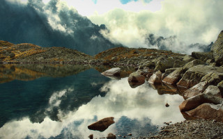 Mountain lake rocks water cloudy - auseklis ozol free wallpaper