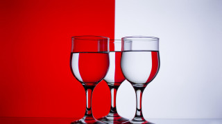 Wine glasses red background white - a red background behind them free wallpaper