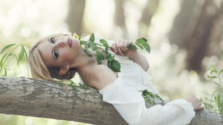 Girl leaf holding vines outdoors - a green plant free wallpaper