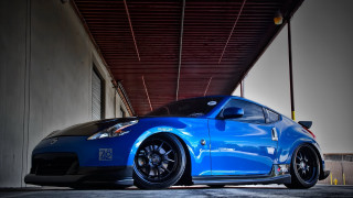 Blue sports car garage open - a garage free wallpaper