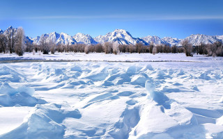 Snowy mountains lake shore blue - field free wallpaper