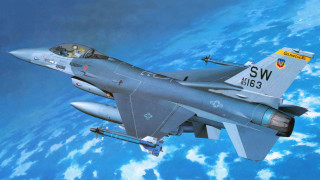 Fighter jet over ocean clouds - a fighter free wallpaper