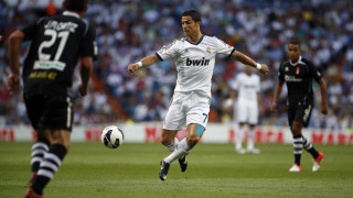 Soccer player kicking ball crowd 2 - a soccer player free wallpaper