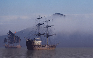 Large boat ocean mountain sunset - free ship wallpaper