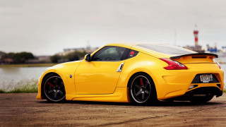 Yellow sports car water city 2 - a cloudy day free wallpaper