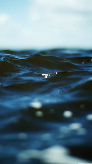 Blurry person water surfboard background - free ship wallpaper for mobile