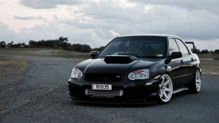 Black car gravel road field 2 - a gravel road next free wallpaper