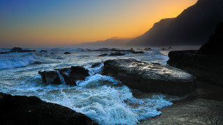 Rocky beach waves sunset mountain - wave free wallpaper