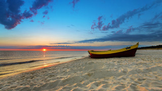Boat sandy beach ocean sunset - a sandy beach next free wallpaper for desktop